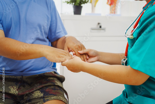 Wallpaper Mural A female doctor sits  a hospital desk,examining a sick male patient with hemorrhoid symptoms,discussing vein swelling at the anus, blood-stained stool,treatment for internal and external hemorrhoids Torontodigital.ca