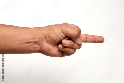 Hand pointing gesture. Index finger pointing. Hand of a Latino man. 