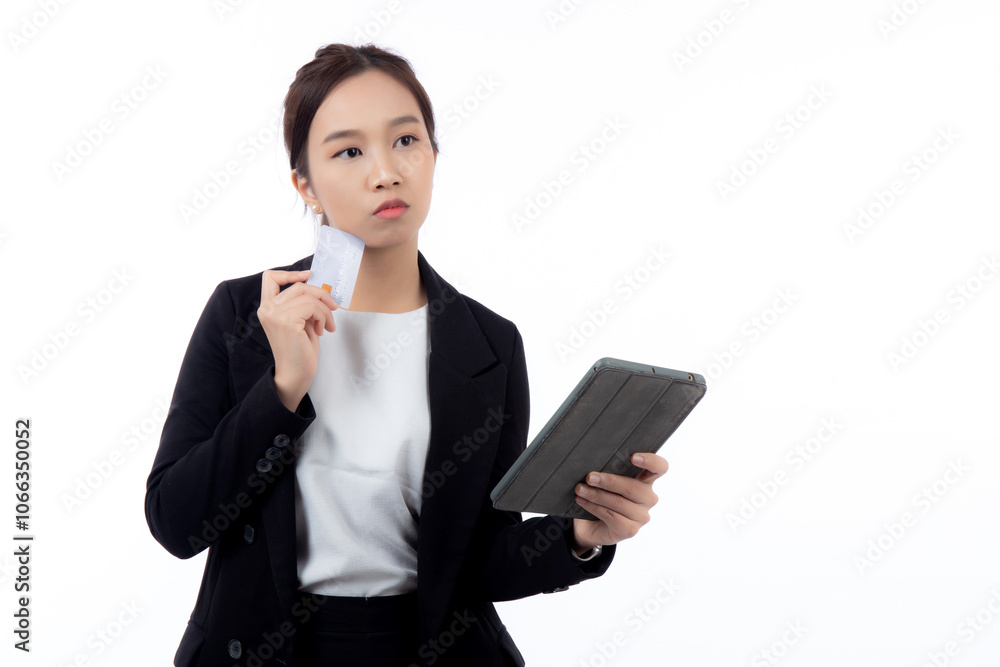 Portrait young asian businesswoman holding credit card and tablet for shopping online and thoughtful isolated white background, business woman paying debit card and thinking with finance. Portrait young asian businesswoman holding credit card and tablet for shopping online and thoughtful isolated white background, business woman paying debit card and thinking with finance.