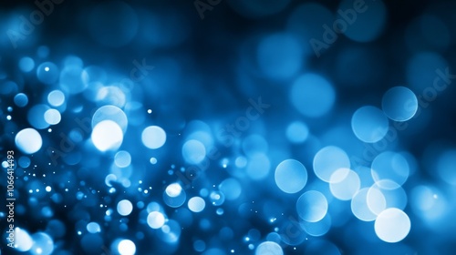 A vibrant blue abstract background with soft bokeh light creating a dreamy effect.