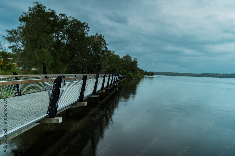 The Red Bluff Boardwalk in Booragul, NSW is a popular attraction that offers shared walking and bicycle pathways The Red Bluff Boardwalk in Booragul, NSW is a popular attraction that offers shared walking and bicycle pathways