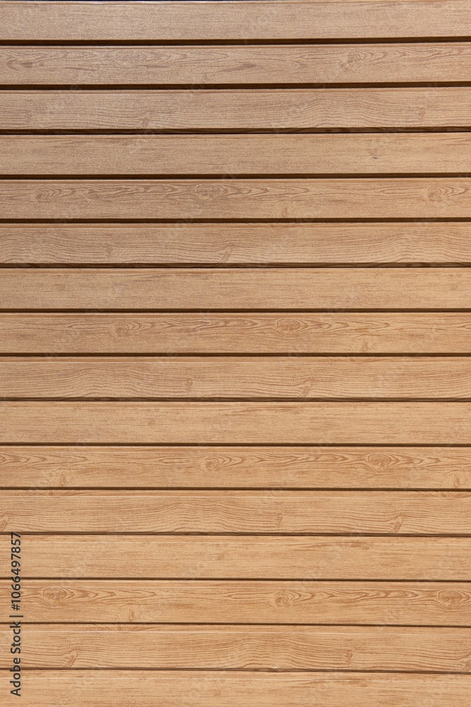 Wall with horizontal wooden planks in light brown color Wall with horizontal wooden planks in light brown color
