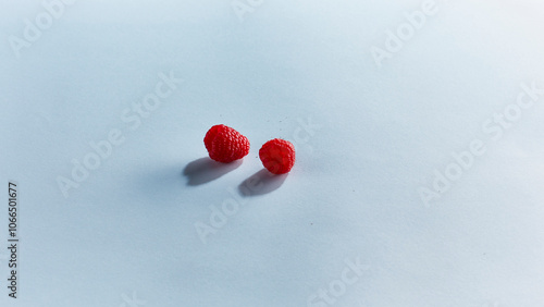 Bright red berry with smooth skin and vibrant color, captured in close-up detail. Fresh red berry isolated on a clean background, perfect for culinary and design use