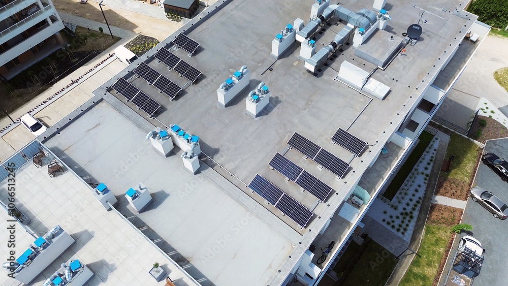 Modern Building Rooftop with Solar Panels Modern Building Rooftop with Solar Panels