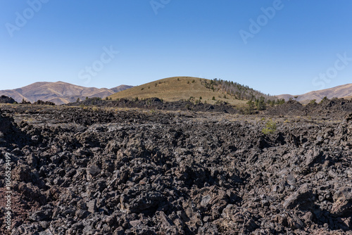 Aa lava flow. Big Craters Slab Lava Flow. North Crater Flow Trail / Craters of the Moon National Monument & Preserve. Volcanic Field. Idaho's eastern Snake River Plain.