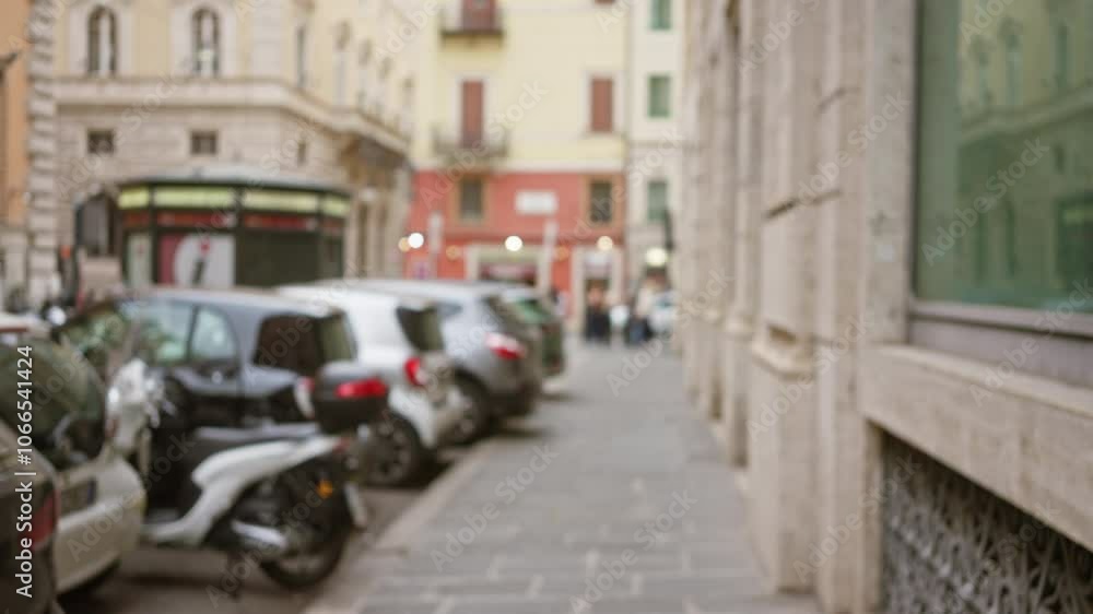 Blurred view of parked cars and scooters along a narrow street in the historic center of rome, italy, with classic architecture in the background. Blurred view of parked cars and scooters along a narrow street in the historic center of rome, italy, with classic architecture in the background.