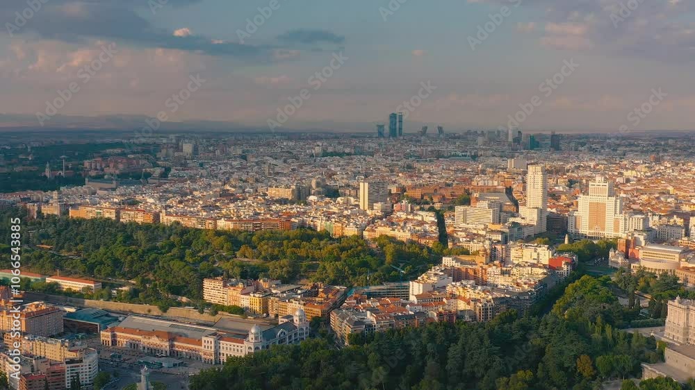 MADRID, SPAIN - OCTOBER 28, 2024: Aerial view of Madrid showcasing urban landscape and historical architecture in evening light MADRID, SPAIN - OCTOBER 28, 2024: Aerial view of Madrid showcasing urban landscape and historical architecture in evening light