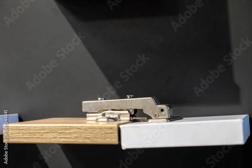 Modern Cabinet Hinge on Wooden Board