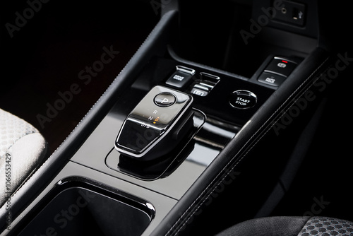 automatic transmission shift selector in the car interior. Closeup a manual shift of modern car gear shifter. 4x4 gear shift