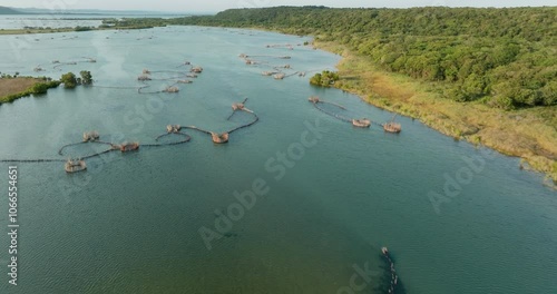 Aerial fly over view of the vast amount of traditional ancient woven fish traps in Kosi Bay Estuary and lakes, Maputaland area of KwaZulu-Natal photo