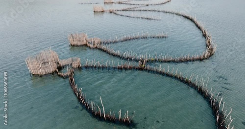 Circular aerial close-up view of the ancient woven traditional fish traps in Kosi Bay Estuary, Maputaland area of KwaZulu-Natal photo