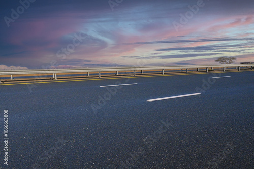 The arid desert climate of Dubai sets the backdrop for a long highway stretching through the golden sands of the UAE