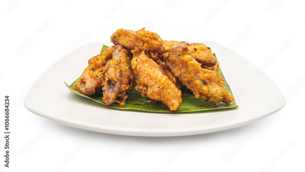 Fried chicken on white plate with white background, asia food, unhealthy food Fried chicken on white plate with white background, asia food, unhealthy food