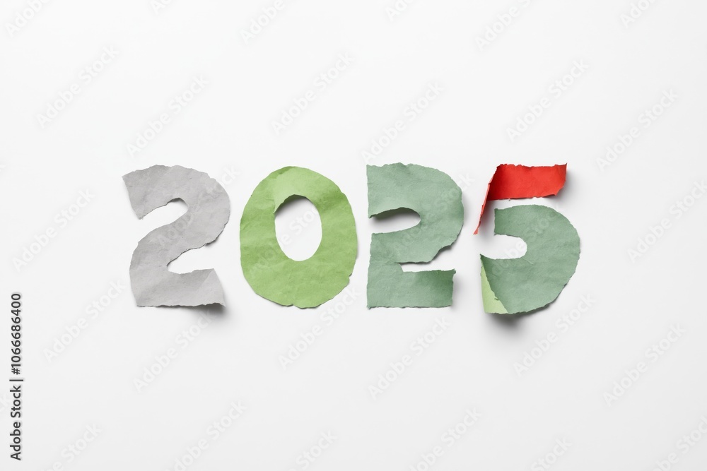 Torn paper numbers forming 2025 on white background Torn paper numbers forming 2025 on white background