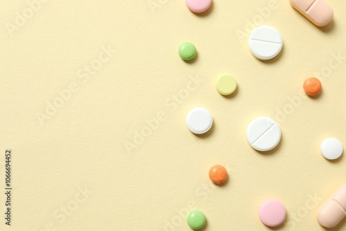 Various medicine pills on color background