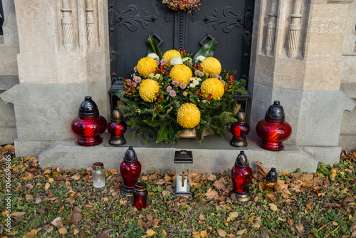 Decorated graves at a cemetery on All Saints Day (Wszystkich Swietych) in Poland. photo