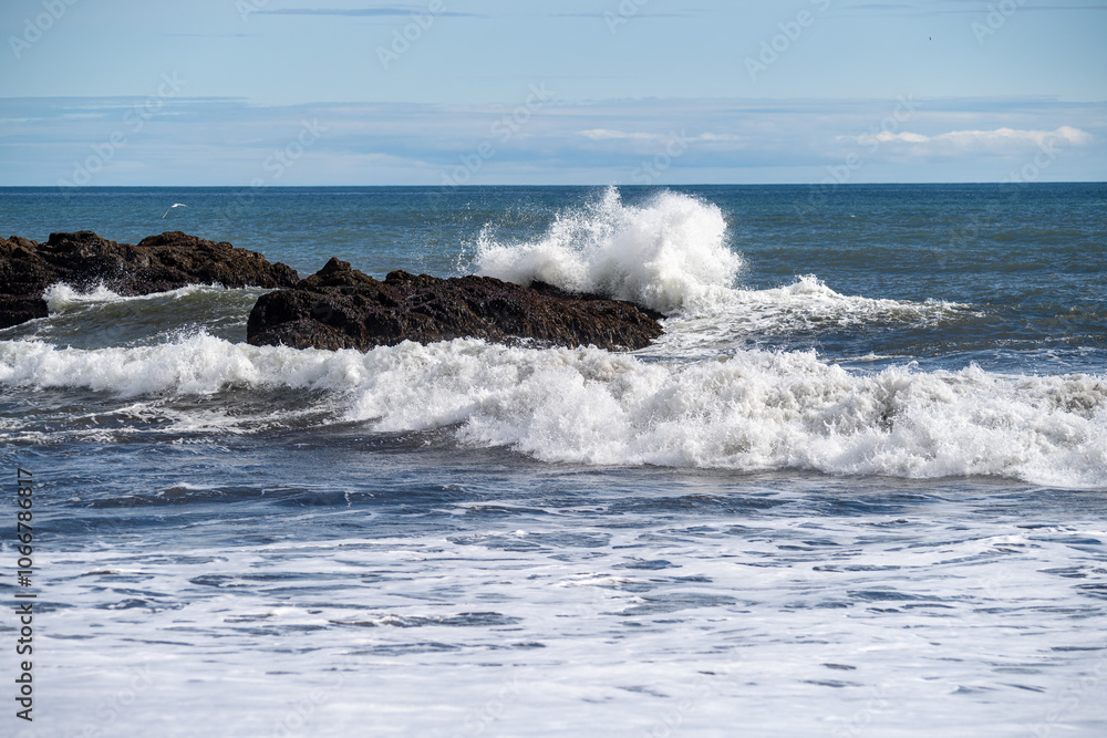 Beautiful landscape with ocean waves crashing against the Icelandic coast Vattarnes Sea cliffs Iceland Beautiful landscape with ocean waves crashing against the Icelandic coast Vattarnes Sea cliffs Iceland