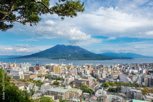 Photos Cityscape with Sakurajima mountain, sea and blue sky background view from Shiroy
