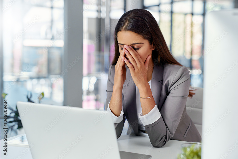 Frustrated woman, laptop and strain with stress for financial crisis, mistake or company bankruptcy at office desk. Young, female person or business employee with headache or depression for debt Frustrated woman, laptop and strain with stress for financial crisis, mistake or company bankruptcy at office desk. Young, female person or business employee with headache or depression for debt