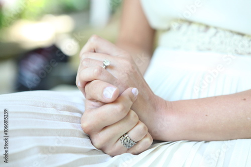 Close-Up of Hands with Elegant Rings and Soft Feminine Details