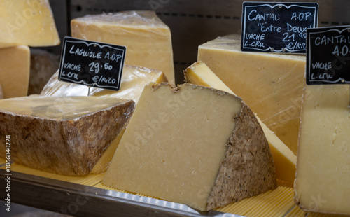 Cheese collection, hard French cheese old cantal fermier made from raw cow milk with rind close up