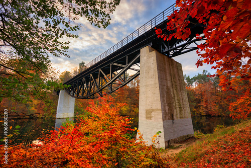 Autumnal scenery and the railway bridge in Rutki, Kashubia. Poland photo