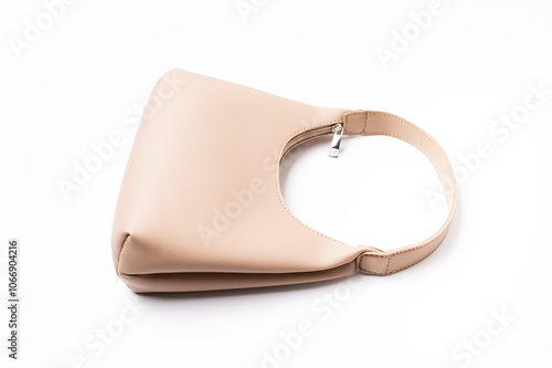 Women's leather beige bag isolated on white background. Fashionable stylish minimalist baguette bag, wine color. Female accessory, object for cutting and design