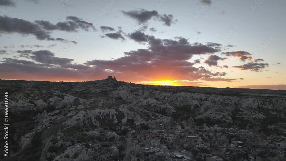 Aerial view with sunset scene  of Uchisar Castle at Goreme Historical National Park in Cappadocia, Turkey