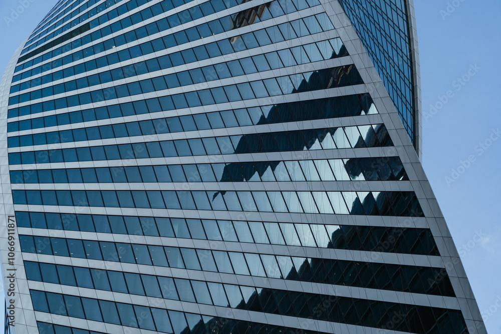 The Reflection of Modern Architecture Seen in a Beautiful Glass Facade of a Building