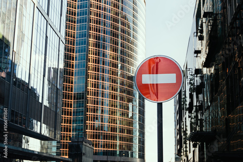Obraz na płótnie A Detailed Urban Landscape Featuring a No Entry Sign Within a Modern Cityscape Setting w salonie