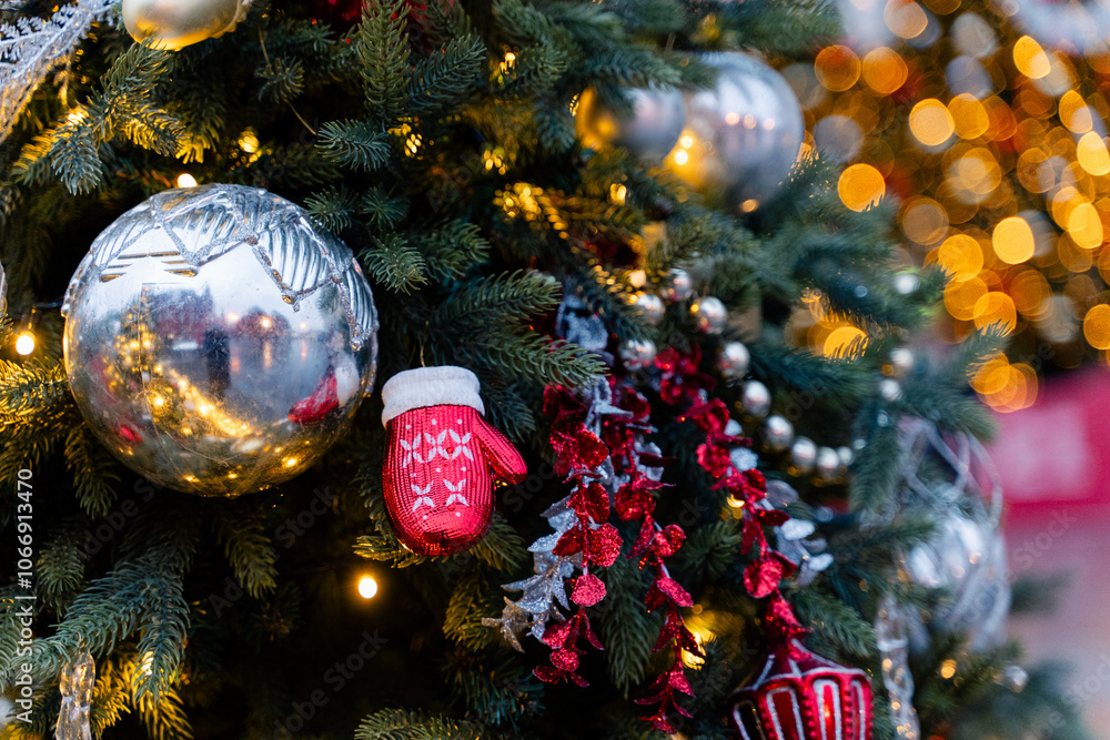 A festive Christmas tree adorned with shiny and cheerful holiday decorations