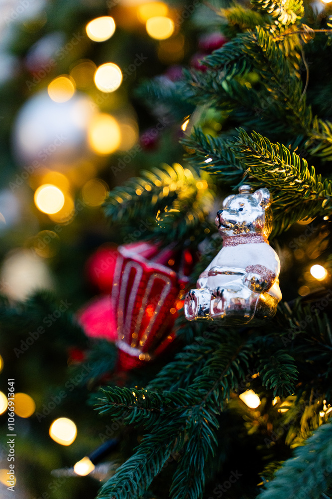 Festively decorated Christmas setting featuring bright red ornaments and a snowy background