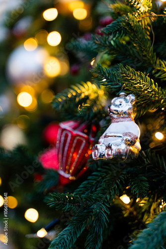Festively decorated Christmas setting featuring bright red ornaments and a snowy background