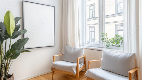 Bright Scandinavian-style room featuring two plush armchairs, a large framed poster against a white wall, and warm decor elements that blend comfort with modern design.