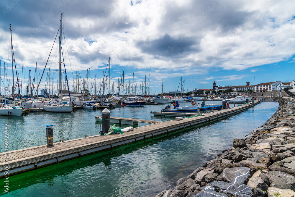 A view across the marina in Ponta Delgada on the island of Sao Miguel in the Azores in summertime A view across the marina in Ponta Delgada on the island of Sao Miguel in the Azores in summertime