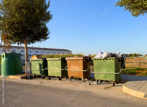 Recycling bins. Trash bins for Garbage Sorting. Waste sorting. Dumpster for Garbage, waste on city Spain street. Junk collection. Waste in garbage container. Trash, Household waste. Removing garbage.