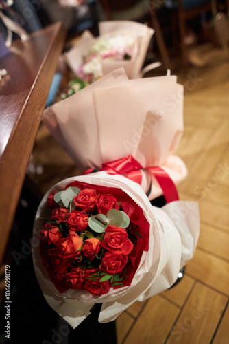 wedding bouquet of red roses. red roses Flower composition. Luxury bouquet of fresh roses. Beautiful red wedding bouquet.	