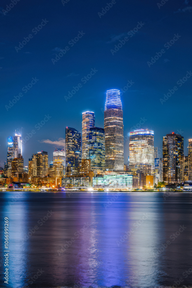 A vibrant city skyline at night with towering skyscrapers and bright lights reflecting on the water, showcasing the beauty of urban architecture. Generative AI A vibrant city skyline at night with towering skyscrapers and bright lights reflecting on the water, showcasing the beauty of urban architecture. Generative AI