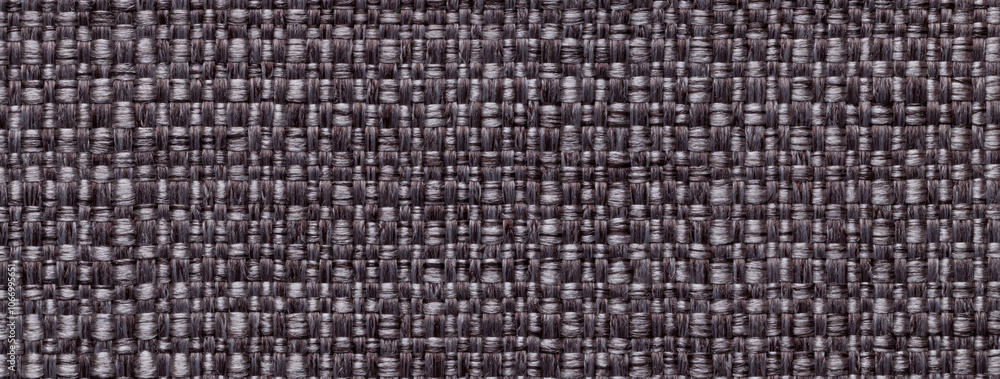 Texture dark brown background from woven textile material with wicker pattern, macro. Structure of umber fabric Texture dark brown background from woven textile material with wicker pattern, macro. Structure of umber fabric