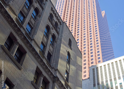 Photography Modern highrise and old buildings and in downtown Toronto against the blue sky
