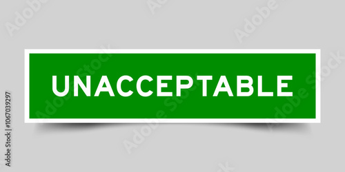 Square sticker label with word unacceptable  in green color on gray background