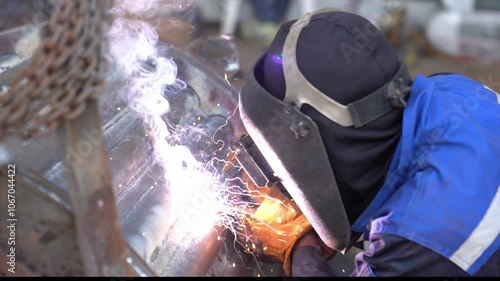 Welder welding boiler tube in an industry