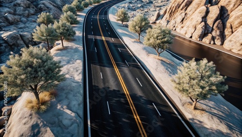 Aerial view of a winding road surrounded by rocky terrain and sparse vegetation, showcasing a scenic journey through rugged landscapes. photo