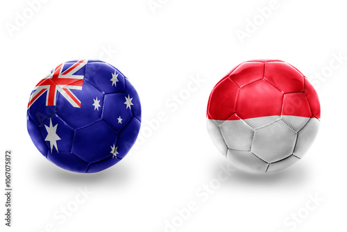 football balls with national flags of indonesia and australia ,soccer teams. on the white background. photo