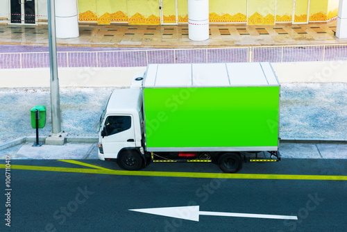 delivery truck parked in a city. eco food truck.  small truck with place for text.