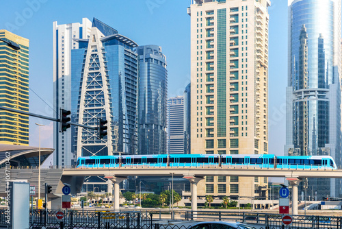 Photography Beautiful view of Dubai city, Dubai metro railway in sunny day.