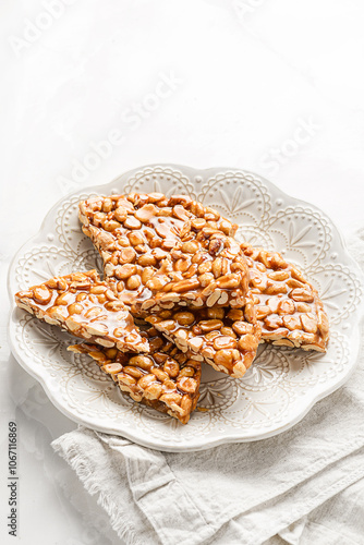 kozinaki dessert made of peanuts and molasses photo