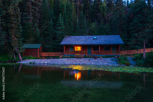 Luxury cabin with nice Summer lake view and forest landscape in Vancouver, Canada, North America. Night time on June 2024.