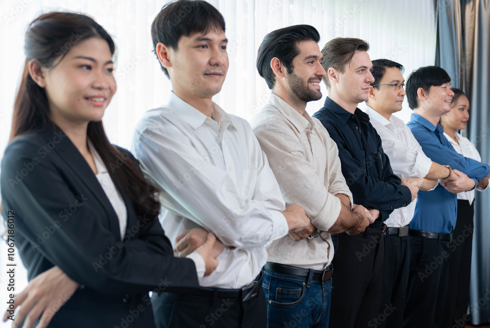 Business team standing, join and link hand together in line symbolize successful business partnership and professional synergy with diverse culture group people cooperation. Prudent Business team standing, join and link hand together in line symbolize successful business partnership and professional synergy with diverse culture group people cooperation. Prudent
