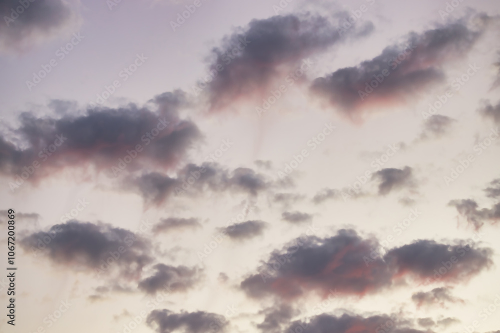 A beautiful sky tinted by the sun leaving vibrant shades of gold, pink, blue and multicolored. Clouds in the twilight evening and morning sky. Cloudy sky background in the evening, and during the day. A beautiful sky tinted by the sun leaving vibrant shades of gold, pink, blue and multicolored. Clouds in the twilight evening and morning sky. Cloudy sky background in the evening, and during the day.